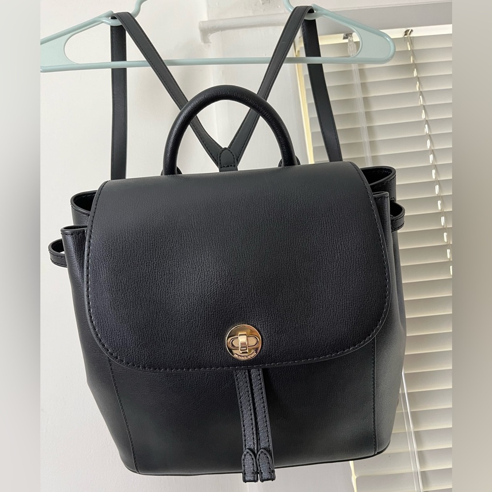 Michael Kors NWT black Rivington leather drawstring backpack with twist lock